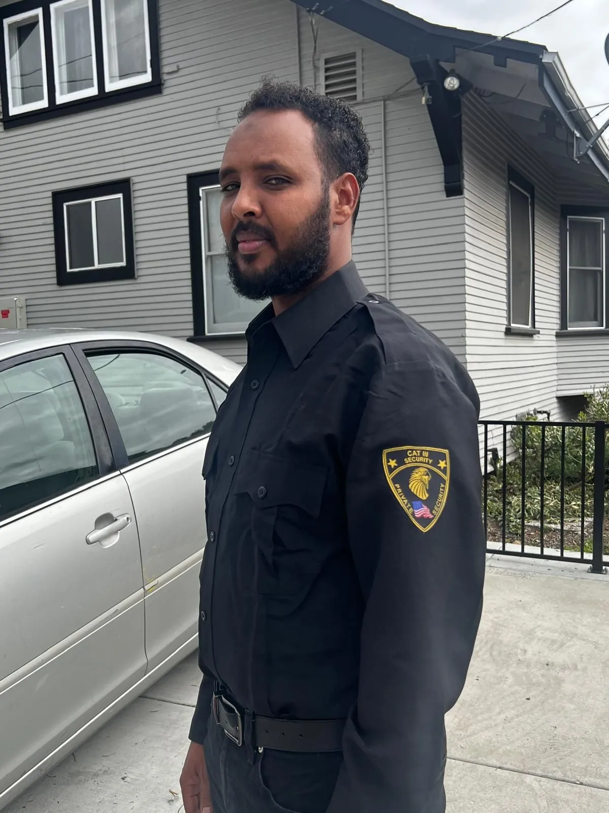 CAT III Security guard in uniform at a client property